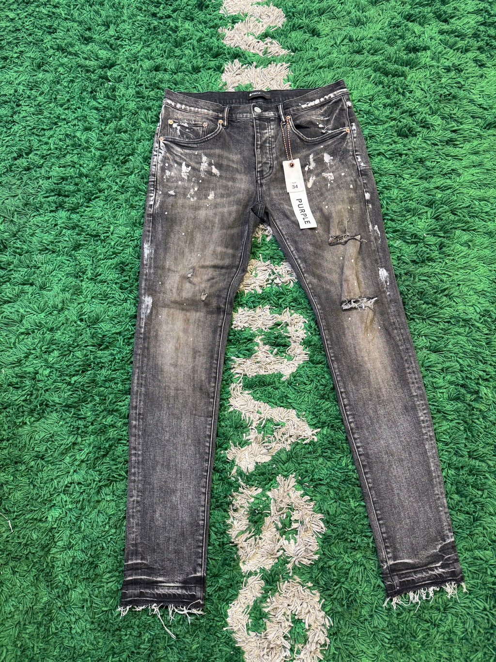 Purple distressed slim fit low rise black