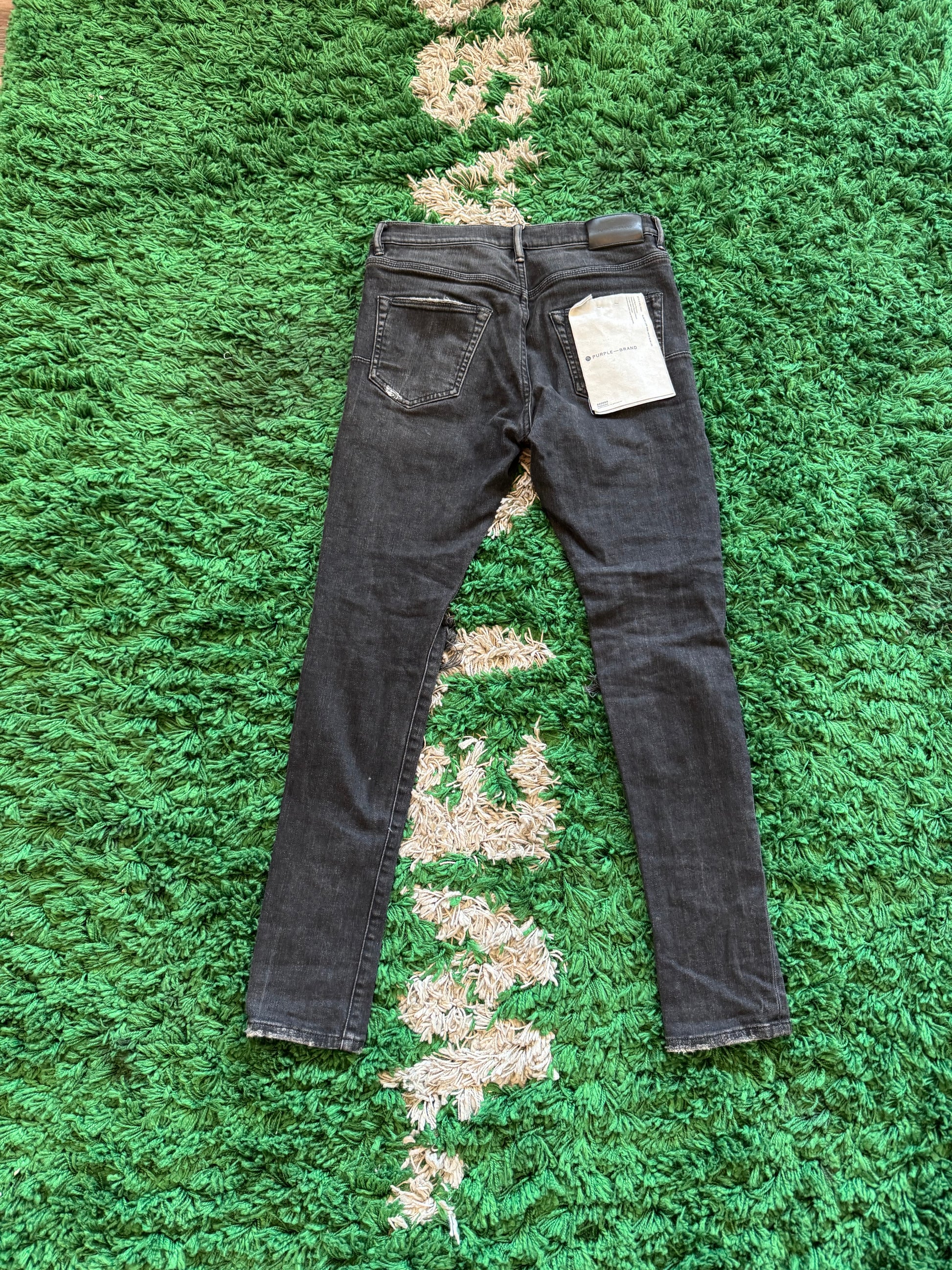 purple brand skinny denim with rips/splatter paint