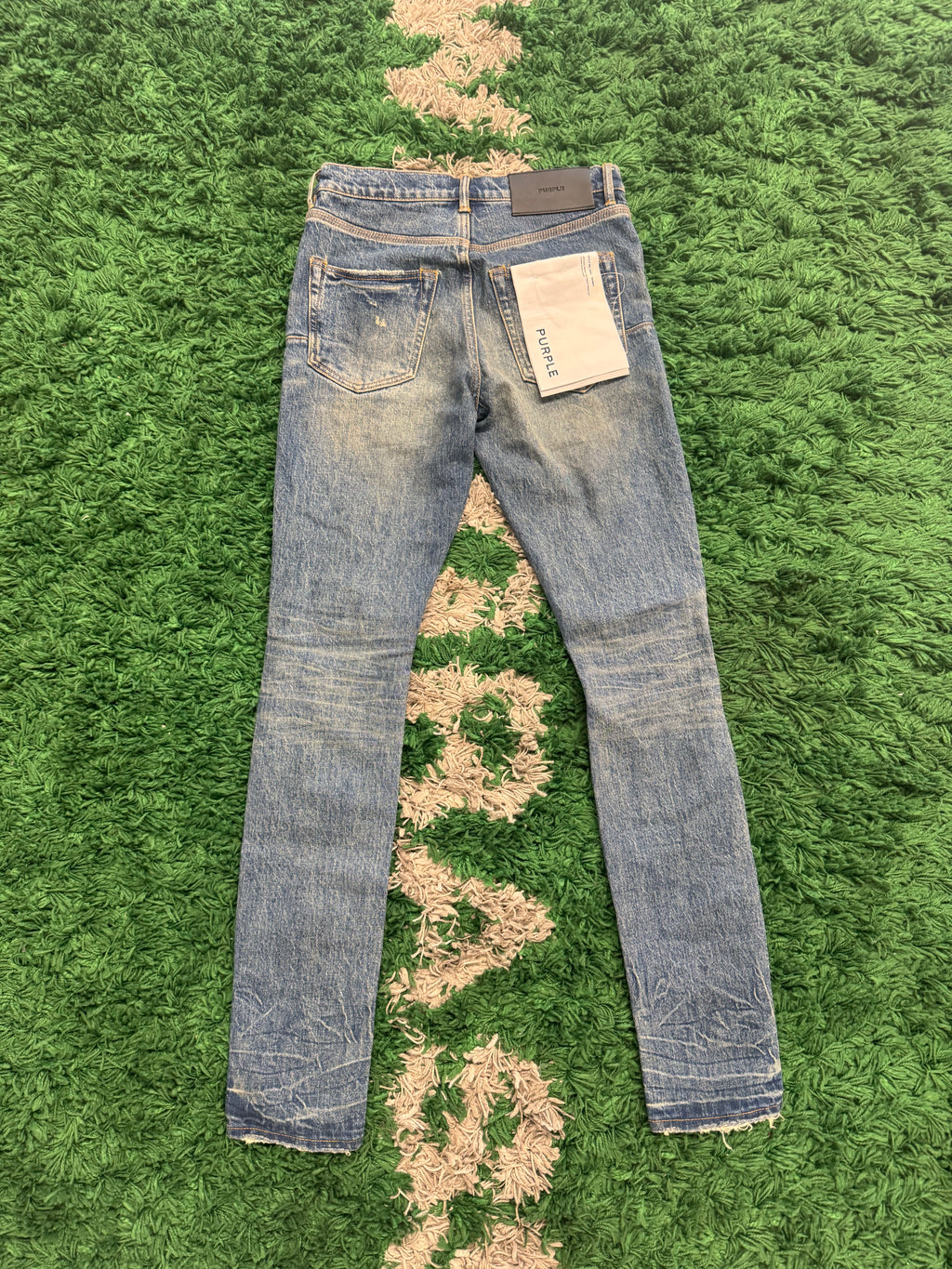 Purple denim light blue skinny distressed